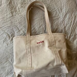 L.L. bean boat tote with “xoxo”
